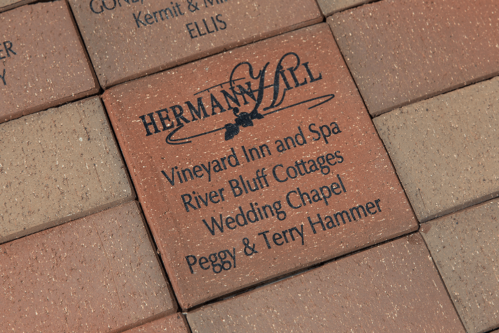 Laser engraved logo on brick for fundraising